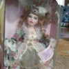 Value of Porcelain Dolls - doll in a box, wearing a glittery ball gown, Collectible Memories