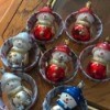 Handcrafted Christmas Ornaments - several ornaments lying on a table