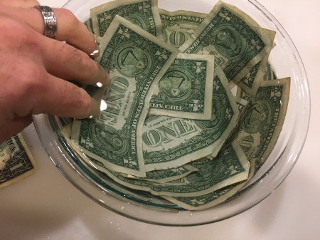 Cold Hard Cash Gift - arranging the bills around the inside of the bowl
