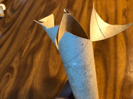 Cardboard Tube Haunted House - cut out 2 triangle from the top of the taller tube
