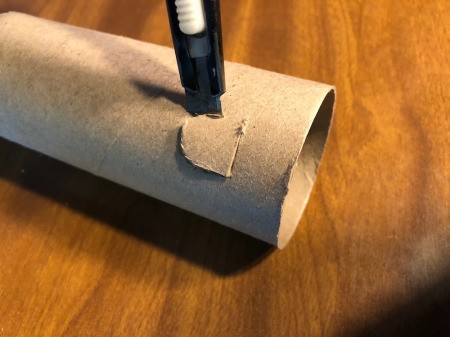Cardboard Tube Haunted House - cut out doors and windows with the knife
