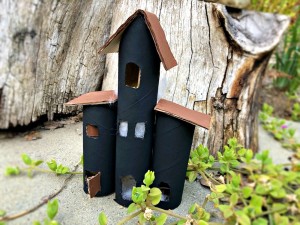 Cardboard Tube Haunted House - outside near a piece of tree stump