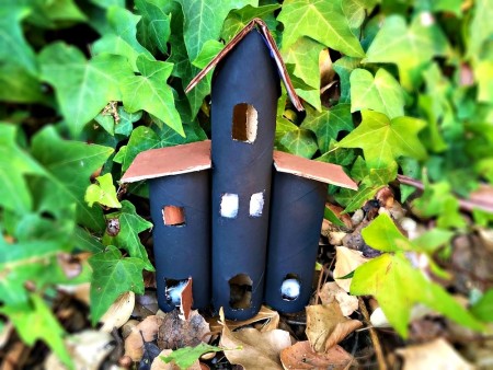 Cardboard Tube Haunted House - drape cotton over or inside for spiderwebs, sitting in the midst of ivy