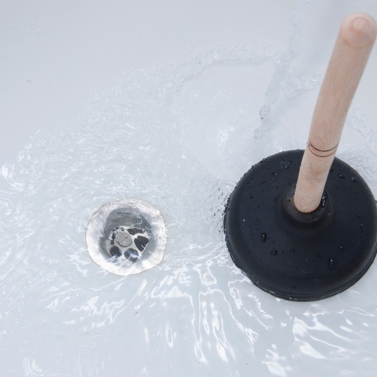Clearing A Clogged Bathtub Drain, How To Remove Hair From Clogged Bathtub Drain