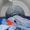 Blue clothes in a dryer