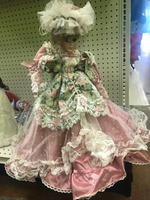 Identifying a Porcelain Doll - doll in fancy pink dress overlain with a  lace layer and a floral overskirt