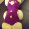 Identifying a Stuffed Toy -purple and white stuffed bear