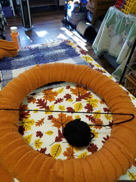 Spiderweb Wreath - stretching yarn across the center to begin web design