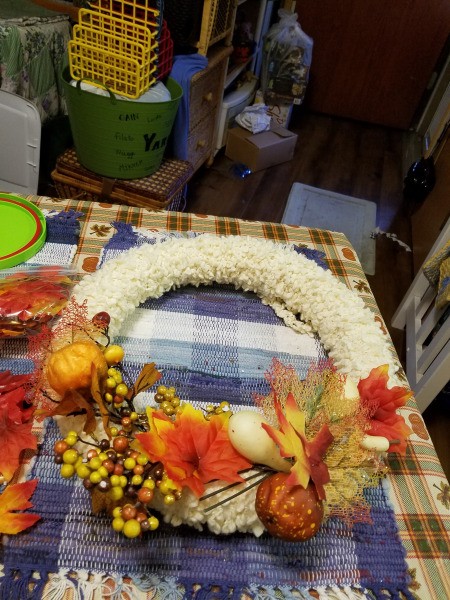 Making a Disassemblable Fall Leaf Wreath - wrapped wreath form with leaves, etc. being added