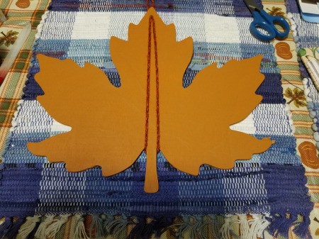 Yarn Embellished Wooden Maple Leaf - yarn down both sides and back around on the sides of the stem