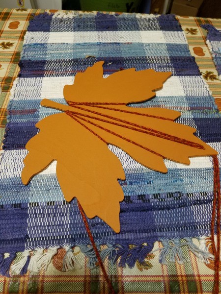 Yarn Embellished Wooden Maple Leaf - start creating a wrapping pattern