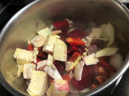 adding cabbage, beets & bell pepper to pot