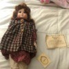 Value of a Doll from the Emerald Doll Collection - doll lying on a bed