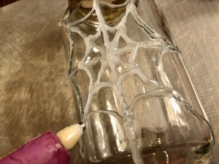 Hot Glue Spiderweb Jar - add a second circle of Us further out