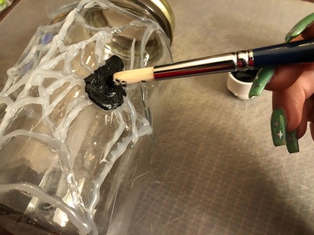 Hot Glue Spiderweb Jar - add 8 glue legs and then paint black