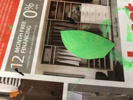 Cardboard Halloween Napkin Rings - green painted paper leaf