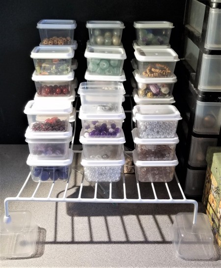 Dollar Tree Bead Storage Solution - plastic containers on a vinyl covered wire rack