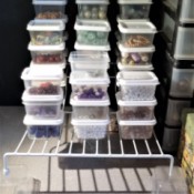 Dollar Tree Bead Storage Solution - plastic containers on a vinyl covered wire rack