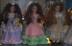 Identifying Porcelain Dolls - three dolls with long curly hair