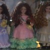Identifying Porcelain Dolls - three dolls with long curly hair