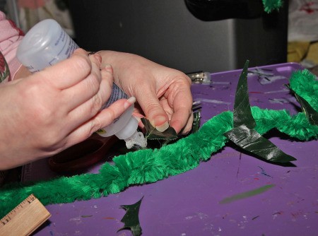 Little Shop of Horrors Costumes - gluing spiky leaf bits to large chenille stems