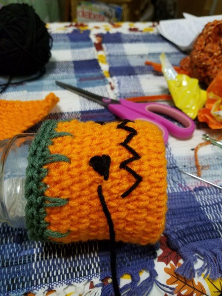 Crocheted Pumpkin Candy Jar Cover - insert jar after seaming the back together