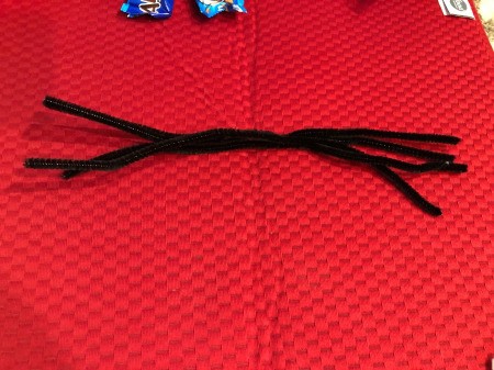 Halloween Candy Spiders - glue 4 pipe cleaners together