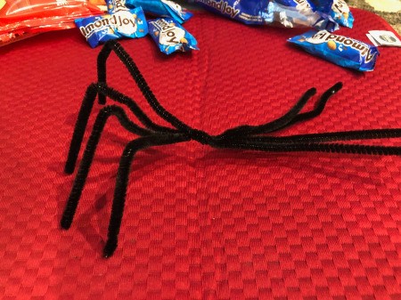 Halloween Candy Spiders - bend pipe cleaners to create the legs