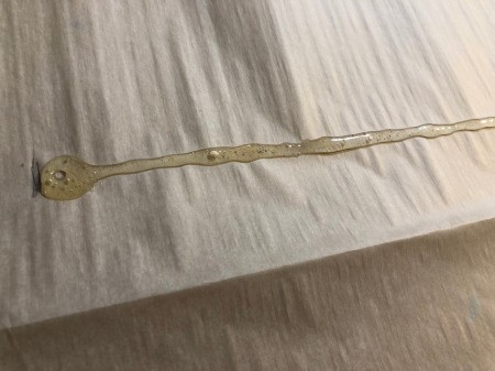 DIY Stitches Choker Necklace - hot glue straight line between the rings