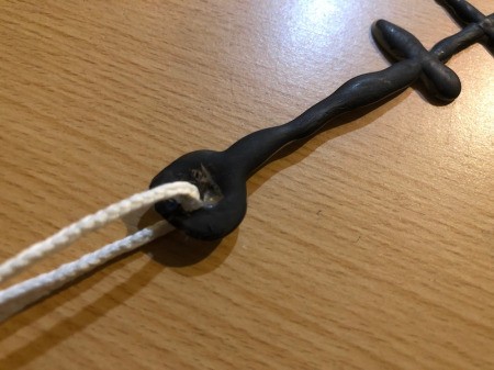 DIY Stitches Choker Necklace - add 5 inches of string through the hole and tie in place the rest wii be to tie onto your neck