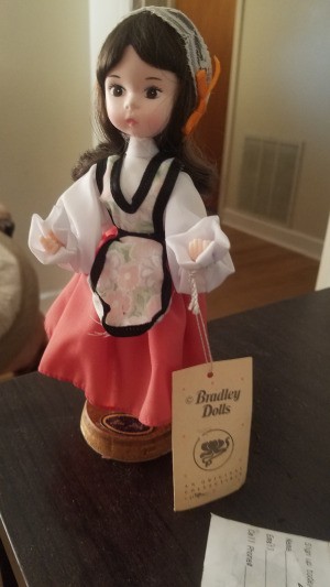 Value of a Bradly Porcelain Doll - doll in native dress