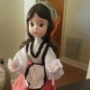 Value of a Bradly Porcelain Doll - doll in native dress