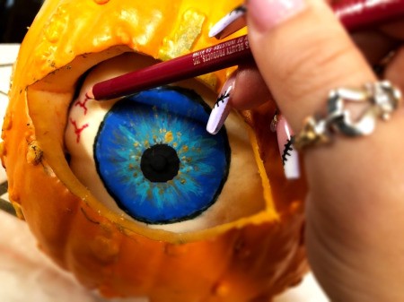 Spooky Double Pumpkin Eyeball - use lipliner to draw veins