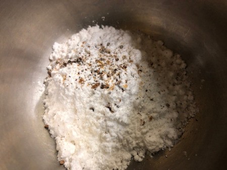 adding ground Cardamom to powdered sugar