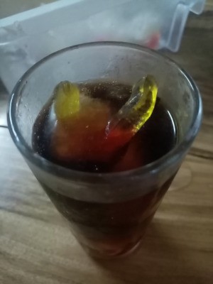 Worm Ice Cubes - dark soda with gummy worm ice cube