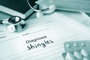 Pad of paper that says "Diagnosis: Shingles"