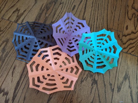 Paper Web and Spider Toss Game - arrange webs and secure with tape to make a multi-web