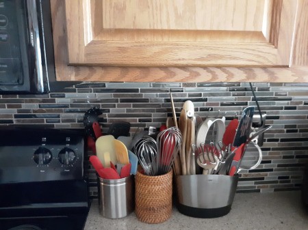 A kitchen counter with no cords showing.