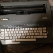 A grey Smith Corona electric typewriter