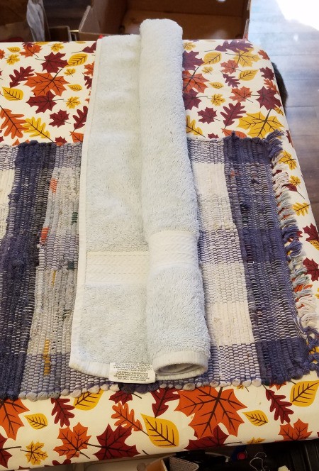 A draft stopper made from recycled towel.