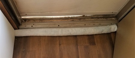 A draft stopper made from recycled towel.