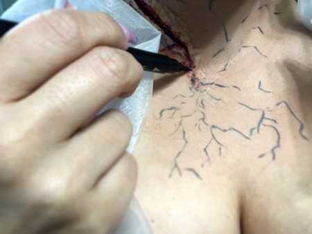 Snow White and the Undead Dwarves - use eyeliner to add veins out from the wound