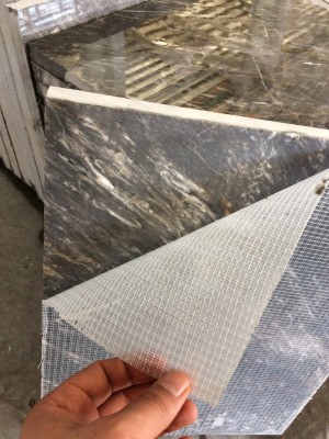 Using Epoxy on Stone - stone with white mesh backing