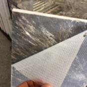 Using Epoxy on Stone - stone with white mesh backing