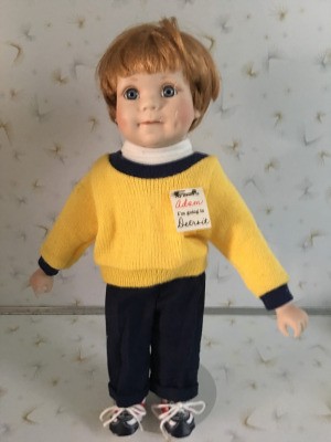 Finding a Replacement Elke Hutchens MBI Doll  - doll with crack on left side of face