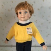 Finding a Replacement Elke Hutchens MBI Doll  - doll with crack on left side of face