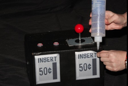 Claw Machine with Stuffed Animal Costumes - adding 50 cent signs