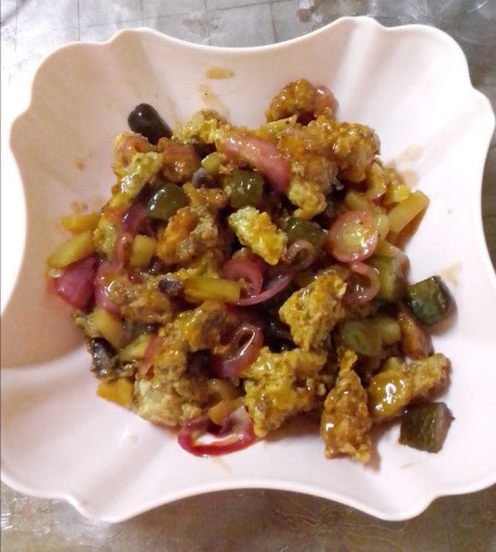 Leftover Roast Pig in Sweet Pickle and Pineapple Sauce in bowl