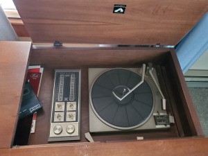 Value of an RCA Victor Model  -vjt31w Console Stereo - looking into the stereo at radio and turntable