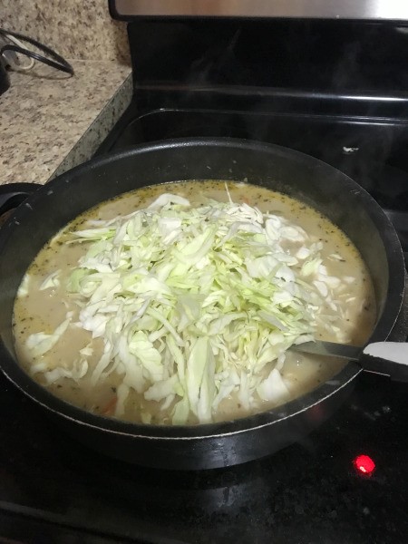 cabbage added to pan